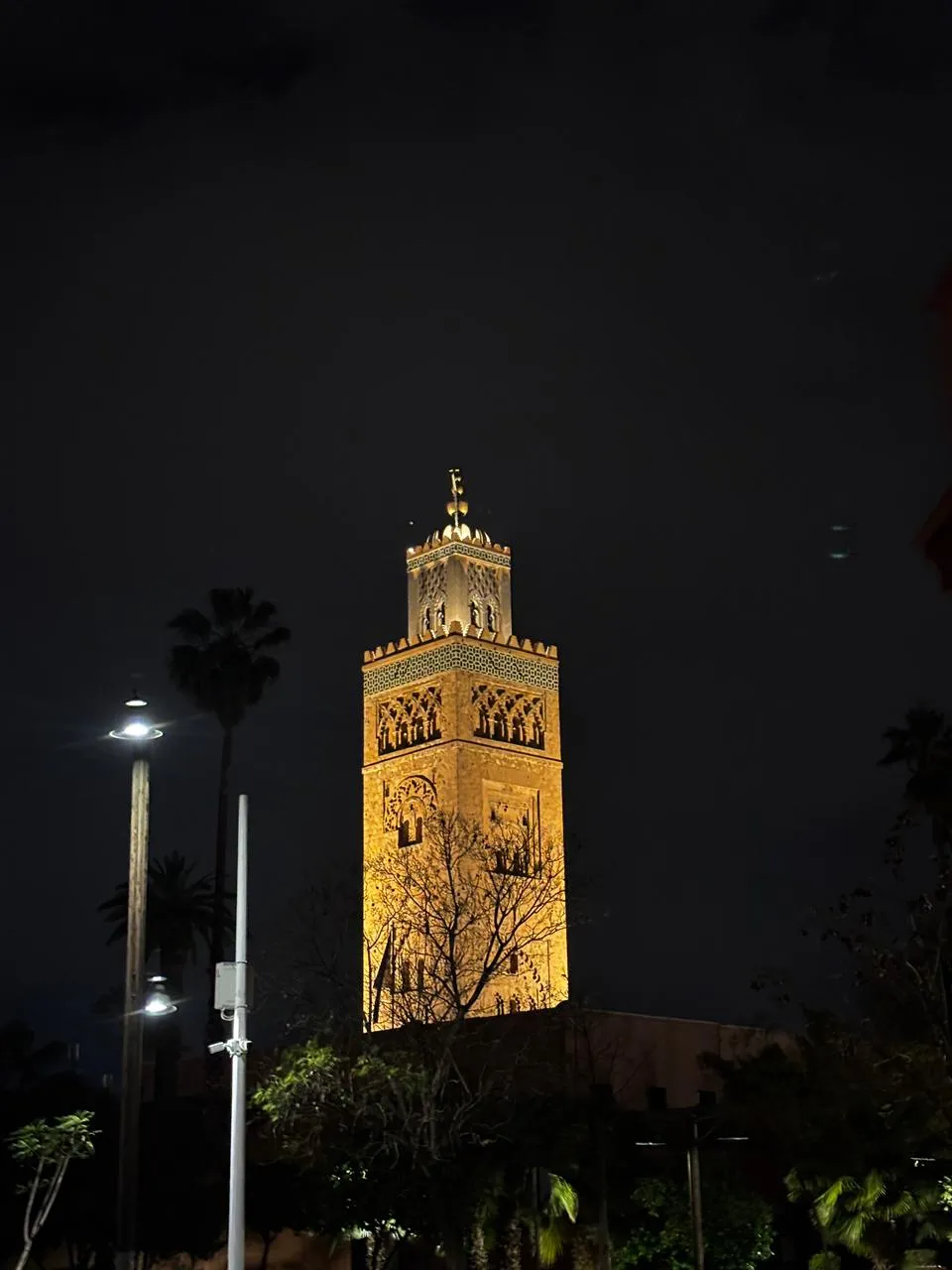 Koutoubia Mosque illuminated at night in Marrakech